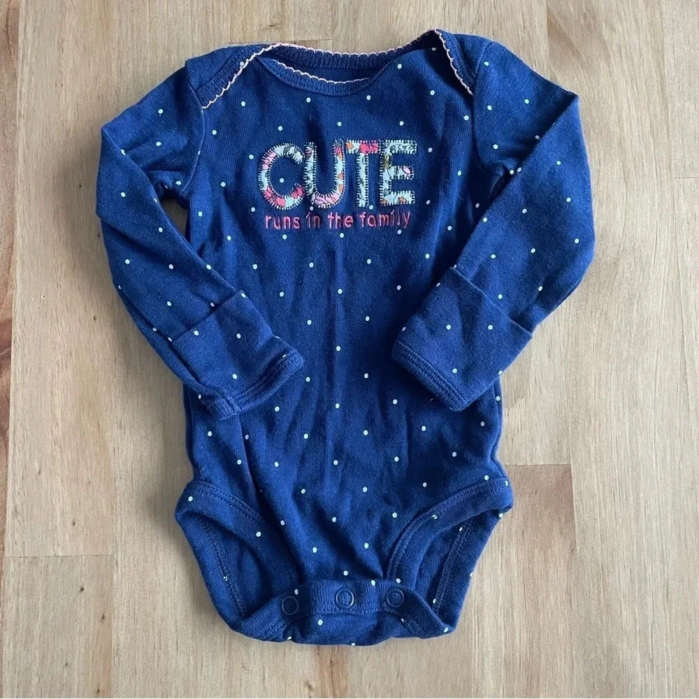 CARTER’S CUTE RUNS IN THE FAMILY ONESIE